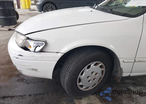 1998 Toyota Camry Le z USA, uszkodzony, nr VIN JT2BG22K9W0159020